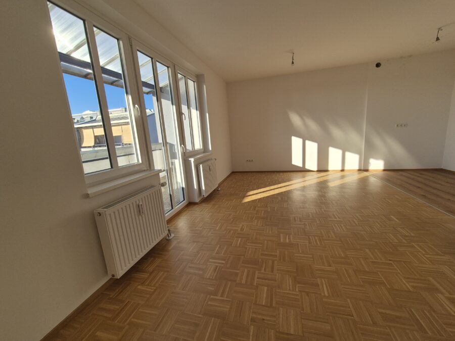 Singlewohnung in ruhiger Wohnanlage **Wohnküche und Schlafzimmer - große Loggia** im 2. Stock ** fix zugeordneter PKW Abstellplatz - 20260119_Wohnzimmer